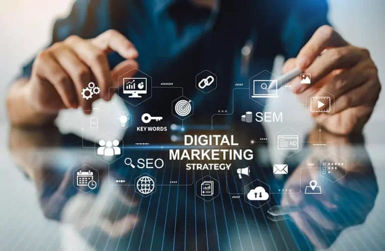 A man is pointing at a digital marketing strategy on a table, emphasizing SEO services.